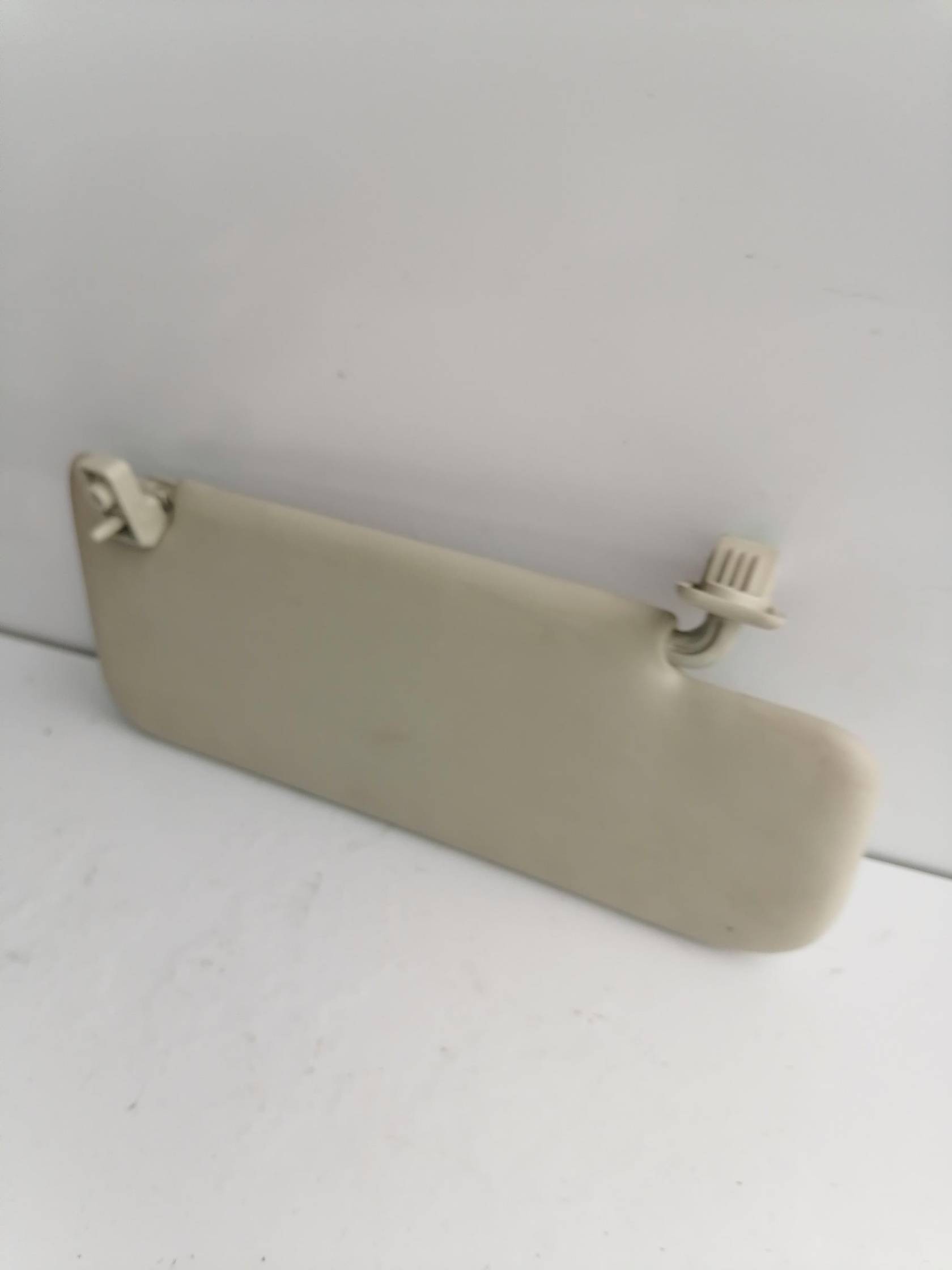 Aletta parasole parabrezza sx.